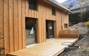 maison ossature bois attignat oncin novalaise savoie terrasse avec banc integre
