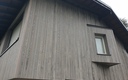 Isolation thermique en façade finition joint debout aluminium et bardage douglas pré-grisé Isolation thermique en façade finition joint debout aluminium et bardage douglas pré-grisé